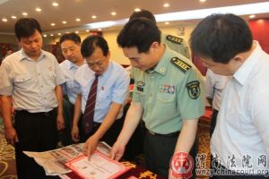 Head of Lanzhou Military District Court visiting local intermediate court